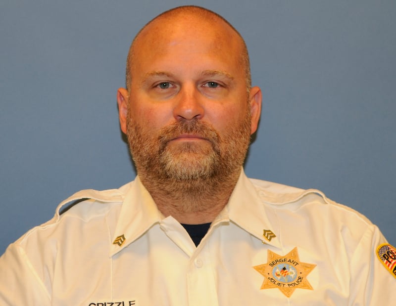 A 2022 employee photo of retired Joliet Police Sgt. Ed Grizzle.
