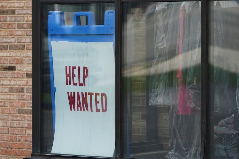 FILE - "Help Wanted" sign is displayed at a dry cleaner in Rolling Meadows, Ill., Thursday, May 15, 2025. (AP Photo/Nam Y. Huh, file)