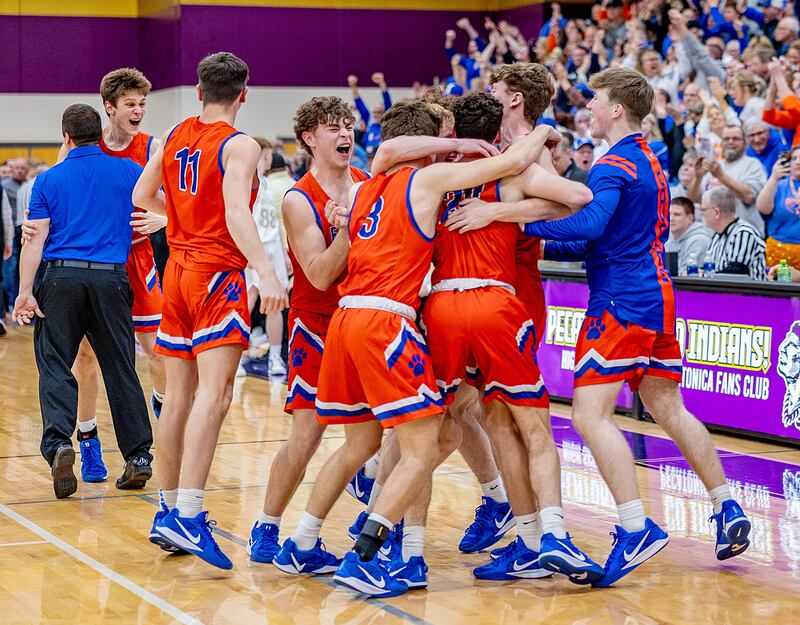 Eastland celebrates after their upset win against Pecatonica in the sectional final on Friday, March 7, 2025 at Pecatonica High School.