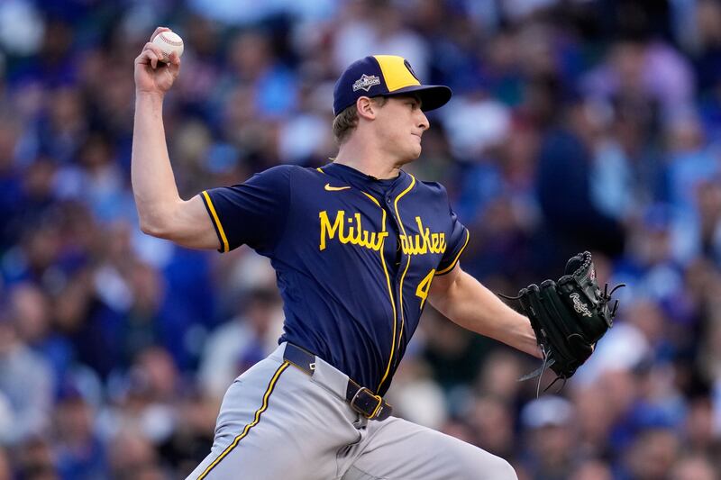 Milwaukee Brewers' Quinn Priester throws during the first inning of Game 3 of baseball's National League Division Series against the Chicago Cubs Wednesday, Oct. 8, 2025, in Chicago. (AP Photo/Erin Hooley)