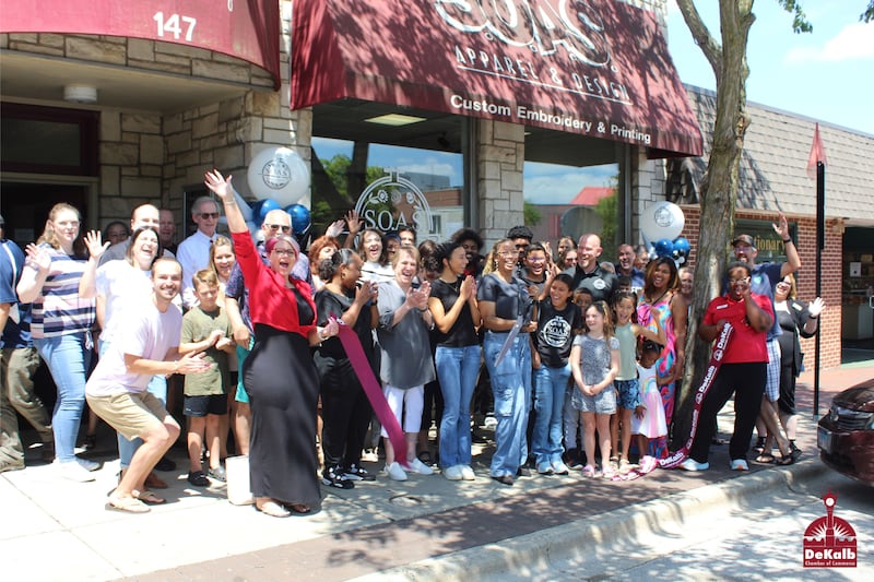 The DeKalb Chamber of Commerce celebrating S.O.A.S. Apparel and Design owner Ashley Erickson’s one year anniversary