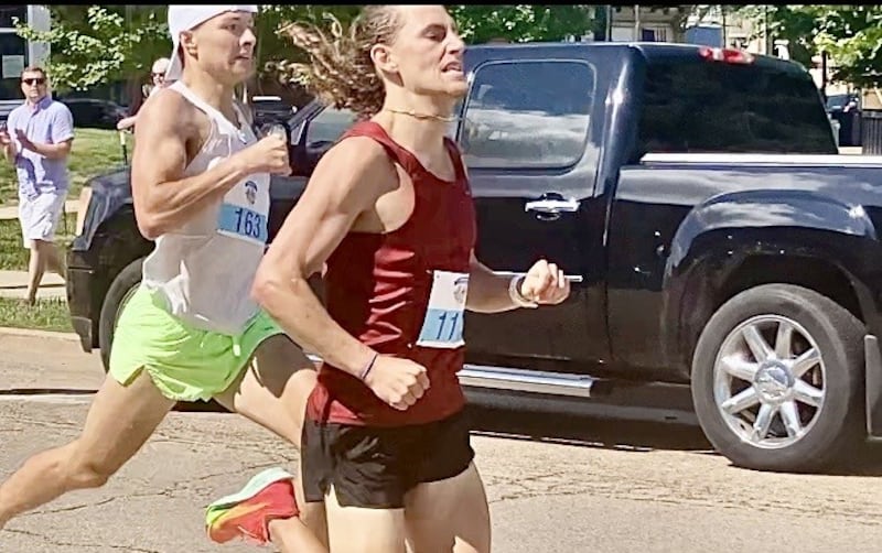 Jake Gillum of Normal edges Nolan Johnson of Sterling at the finish line to repeat as the Princeton Mile champion on Saturday running on Main Street.