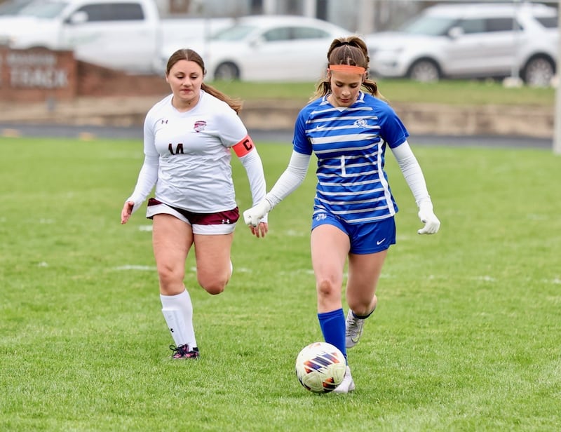 Princeton's Olivia Sandoval pushes the ball up the pitch during Tuesday's soccer match at Bryant Field against IVC. She scored two goals in the Tigresses' 9-0 victory.