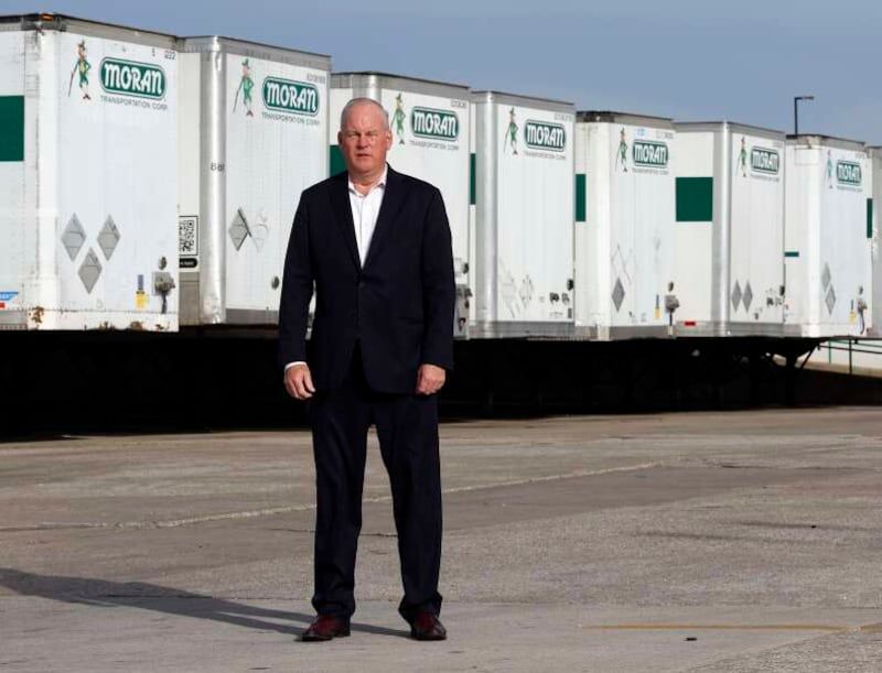 Moran Transportation Corp. President Mike Moran stands outside his fleet Thursday, Nov. 6, 2025, in Elk Grove Village. Moran's trucking company will have to pay thousands more a year if Gov. JB Pritzker signs a bill hiking tolls.
