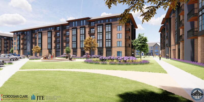 A rendering shows the Cordogan Clark and Associates proposal for five-story apartment blocks with about 200 units oriented by Route 14 and surrounded by three-story buildings of 50 townhomes. The Cary Village Board selected Cordogan Clark as the developer for the site on Jan. 21, 2025.