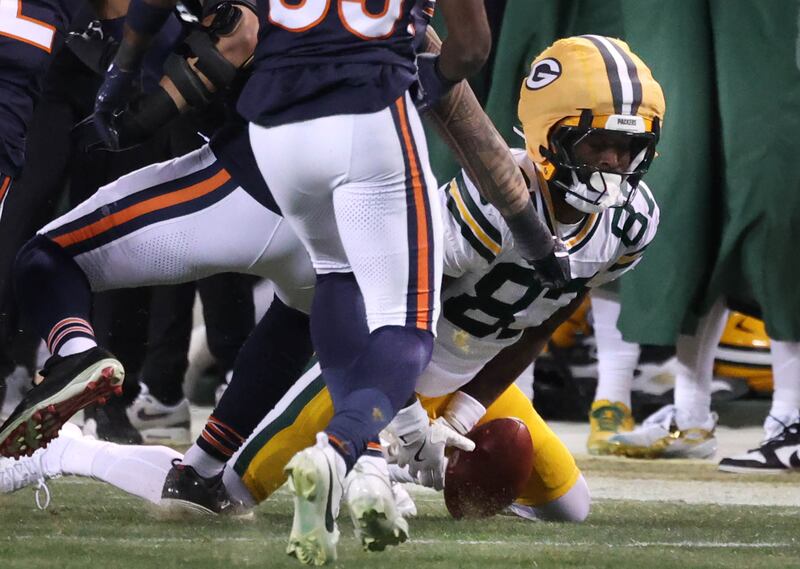 Green Bay Packers wide receiver Romeo Doubs can’t corral the on-side-kick and it is recovered by the Chicago Bears Saturday, December 20, 2025, during their game at Soldier Field in Chicago.