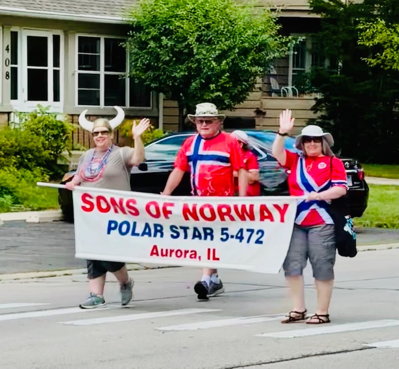Suburban Chicago Norwegian-Americans from Sons of Norway Polar Star Lodge 5-472 marched in the Swedish Days Parade in Geneva on June 23, 2024. From left are Kelly Welin, Wheaton; Floyd Anderson, Yorkville; and Stephanie Welin, Dana Point, California.