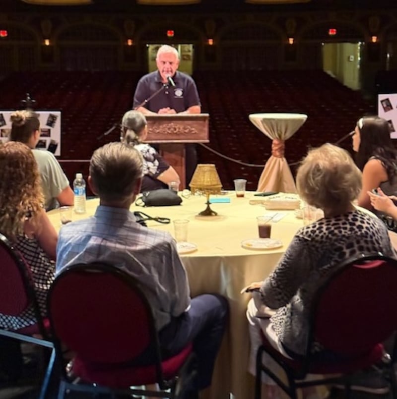 Lorin Lynch shares stories of his 51 years of service to Joliet's Rialto Square Theatre with about 100 friends, family and fellow stagehands who gathered at the theater to honor him on Thursday, July 24, 2025.