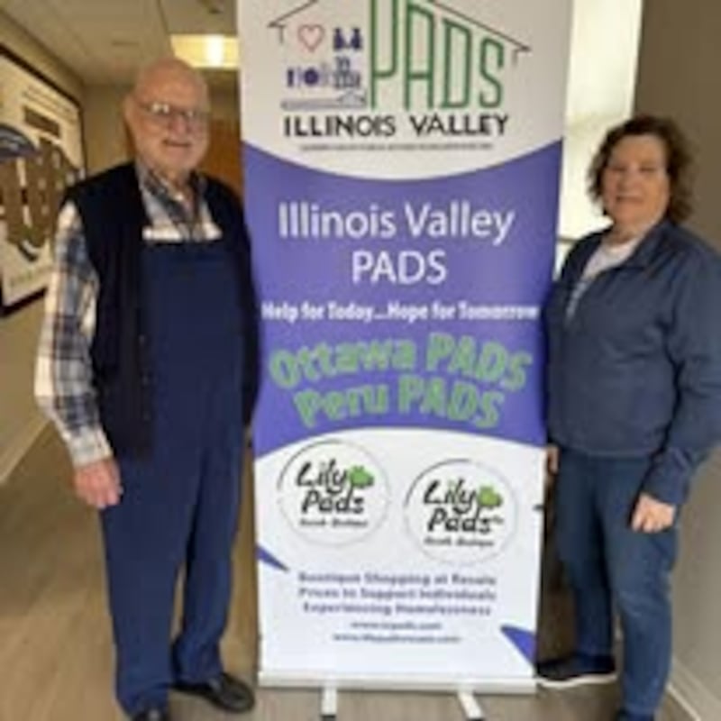 Dave Michelsen of Earlville (left) donated $10,000 on Jan. 9, 2026, to Illinois Valley Public Action to Deliver Shelter in memory of his wife, Helen. “We are deeply grateful for community members who remember our shelters in Ottawa and Peru during life’s most difficult moments," said Carol Alcorn (right), executive director of PADS. "Dave’s generosity helps us continue our mission and encourages others to follow his lead and supporting those in need.”