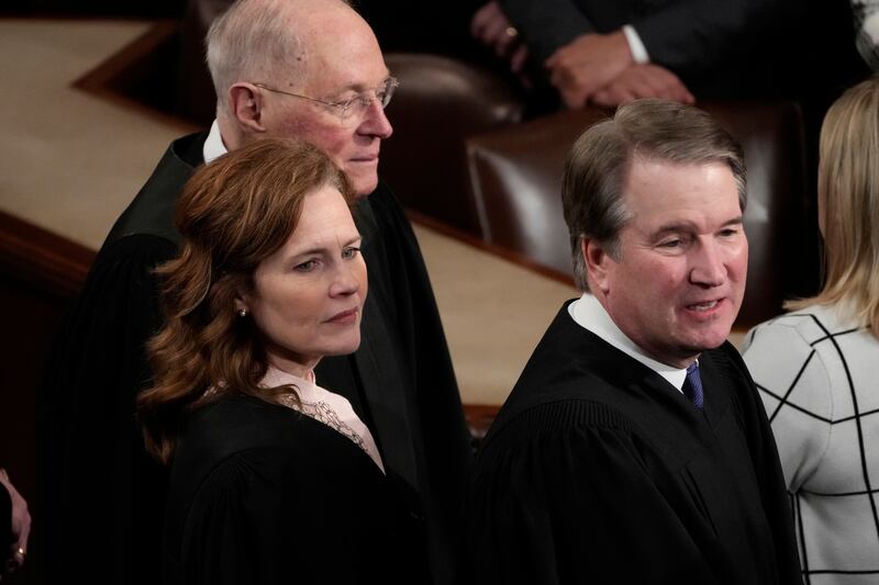 Retired Supreme Court Justice Anthony Kennedy, Supreme Court Justice Amy Coney Barrett, and Supreme Court Justice Brett Kavanaugh arrive before President Donald Trump addresses a joint session of Congress in the House chamber at the U.S. Capitol in Washington, Tuesday, March 4, 2025. (AP Photo/Julia Demaree Nikhinson)