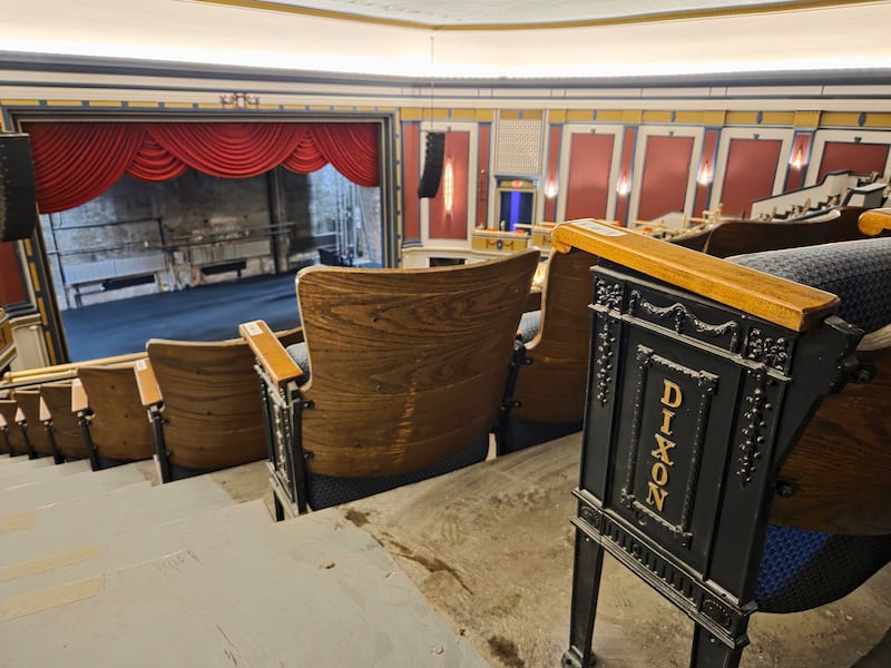 Today’s balcony seats at The Dixon: Historic Theatre are from 1922. Note the “DIXON” emblem.
