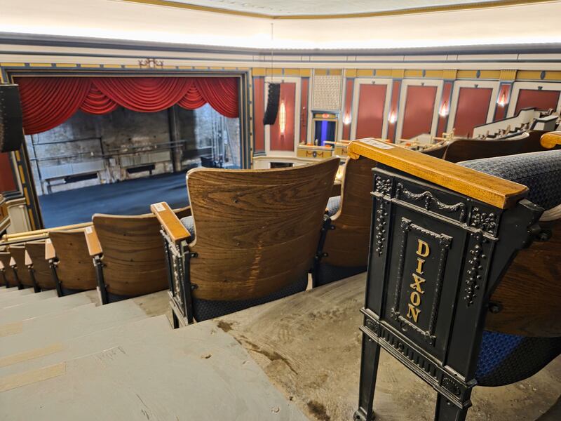 Today’s balcony seats at The Dixon: Historic Theatre are from 1922. Note the “DIXON” emblem.