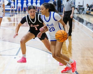 Photos: St. Charles East vs. St. Charles North girls basketball
