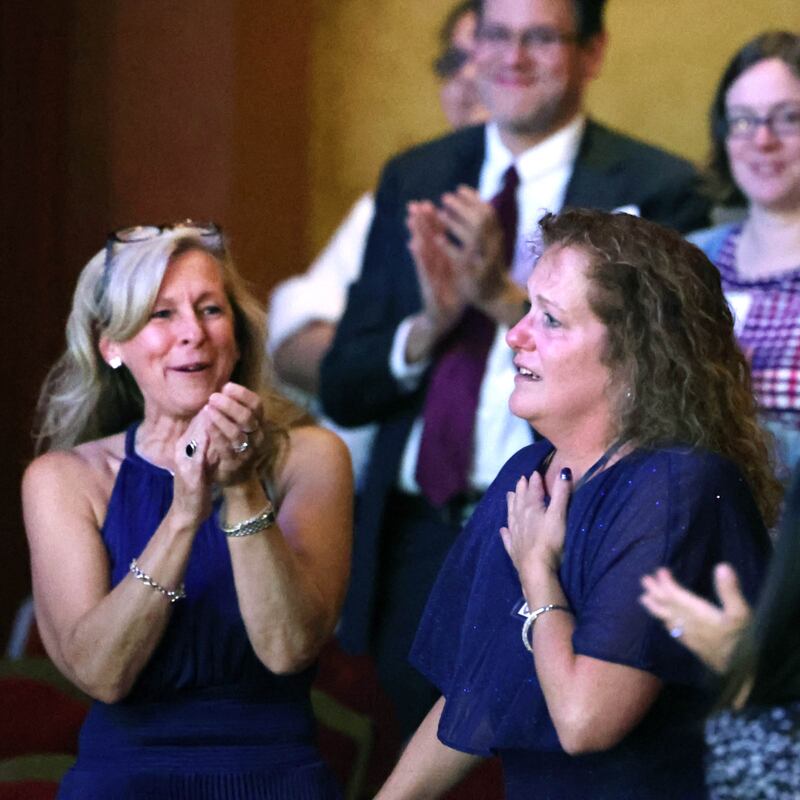 Jennifer Yochem (right) and her presenter Christine Kalina react as Yochem is announced as the 2024 Athena Award recipient Thursday, Oct. 10, 2024, during the Athena and Women of Accomplishment awards reception hosted by the DeKalb Chamber of Commerce at the Egyptian Theatre.