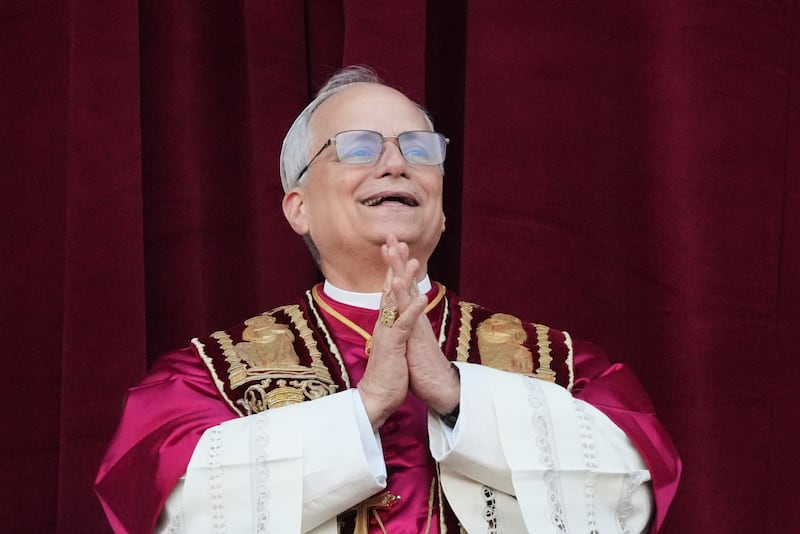 Newly elected Pope Leo XIV appears at the balcony of St. Peter's Basilica at the Vatican, Thursday, May 8, 2025. (AP Photo/Alessandra Tarantino)
