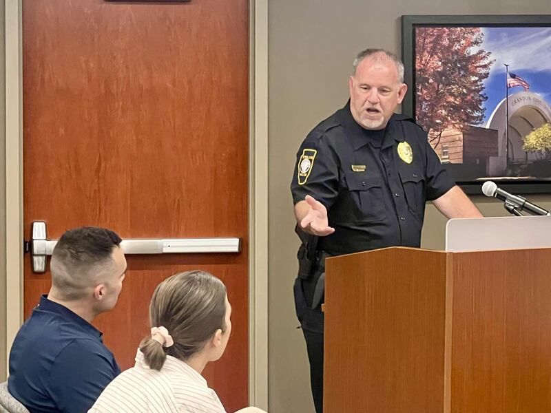 Sterling Police Chief Pat Bartel addresses the City Council on Oct, 6, 2025, as Ryan and Ashley Nares listen during discussion of a proposed extended-hours permit for local businesses.