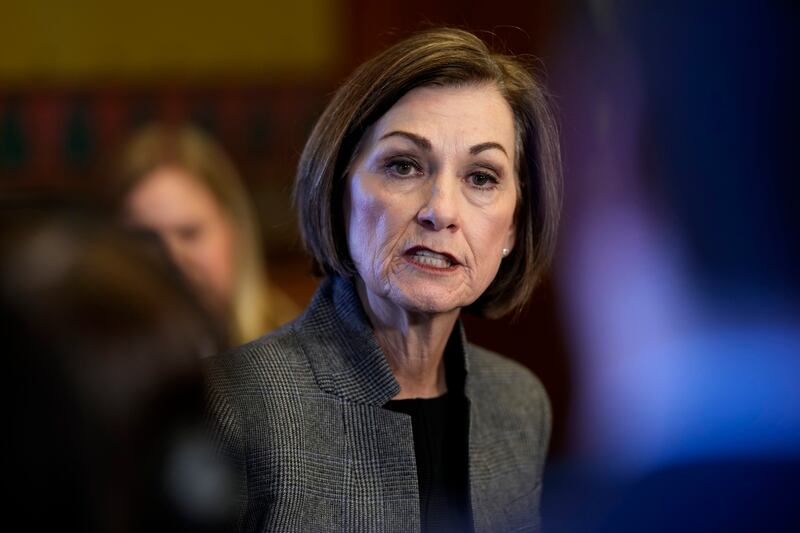 FILE - Iowa Gov. Kim Reynolds speaks during a news conference at the Statehouse in Des Moines, Iowa, Jan. 31, 2024. (AP Photo/Charlie Neibergall, File)