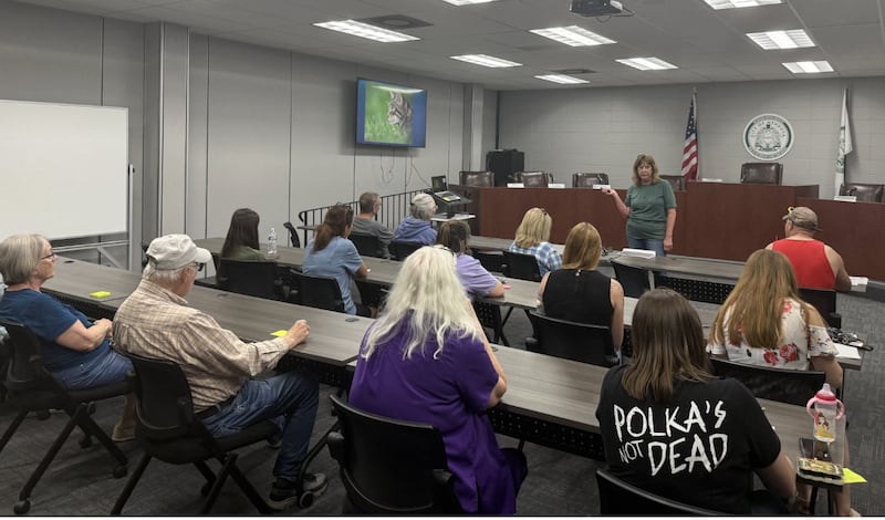 Sandy Knott, a volunteer with the Safe House Animal Rescue League, addresses Mendota residents on a new TNR program to be implemented within the city at an informational meeting on Monday, May 18, 2026 in Mendota City Council chambers.