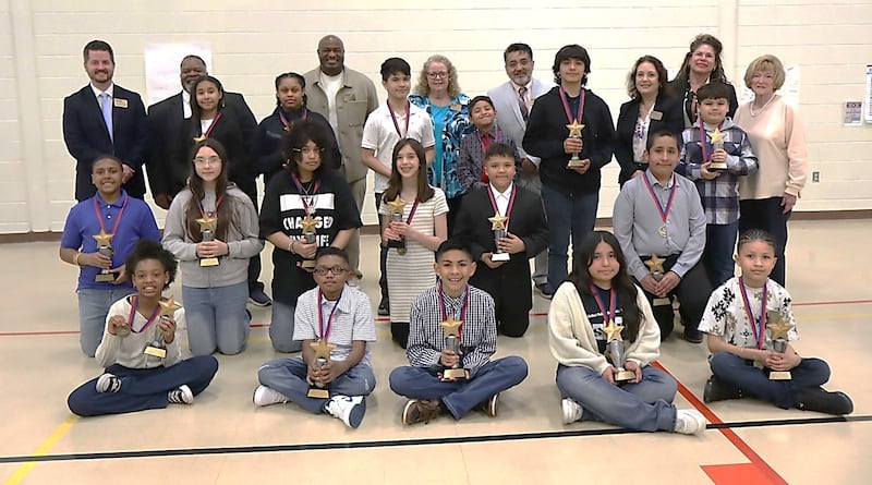 Joliet Public Schools District 86 Hawk Scholarship winners with members of the Joliet Public Schools Board of School Inspectors after receiving their awards.
