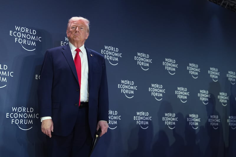President Donald Trump stands on the stage prior to addressing a meeting of Global Business Leaders at the Annual Meeting of the World Economic Forum in Davos, Switzerland, Wednesday, Jan. 21, 2026. (AP Photo/Evan Vucci)