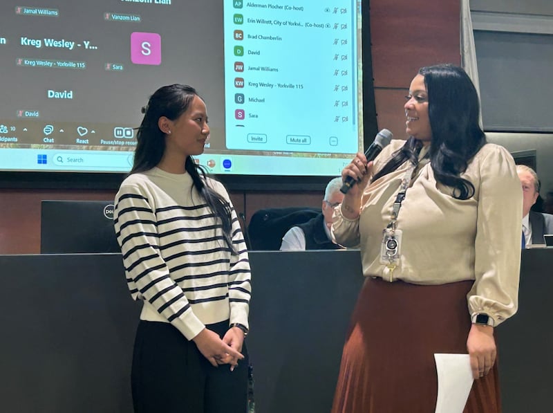 Community development director Krysti Barksdale-Noble (right) welcomes new city planner Thian Dim to Yorkville's community development department during the Jan. 27, 2026 City Council meeting.