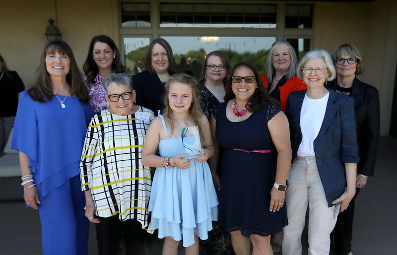Shaw Local/Northwest Herald's 2026 Women of Distinction Award recipients are: (front row from left) Lori Parrish; Betty Koch; Ariya Rose, standing in for her mother, Rachel Skubiszewski; Heidi Olsen, Lisa Haderlein; (back row from left) Emily Smith; Jaki Berggren; Becky Morris; Jessica Lombard; and Carol Chrisman. The women were honored at a reception Wednesday June 3, 2026, at Boulder Ridge Country Club in Lake in the Hills.