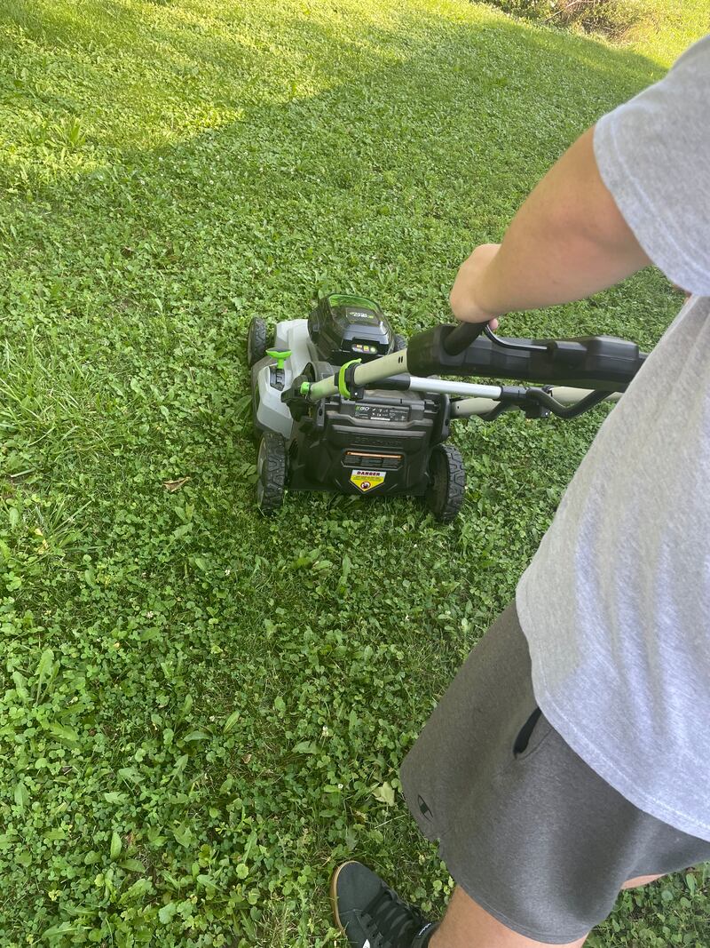 Using electric lawn mower