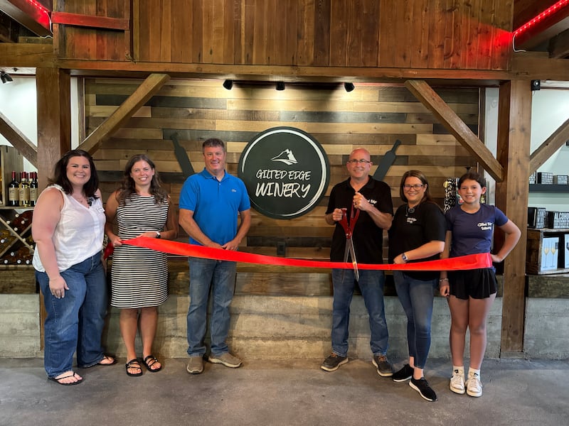 Gilted Edge Winery in Newark owners Ken and Laura Loos cut the ceremonial ribbon to celebrate their Grundy County Chamber membership July 25. They were joined by their daughter, Kendall County Board Chairman Matt Kellogg, Kendall County Administrator Christina Burns and Chamber Events Director Lena Wickens.