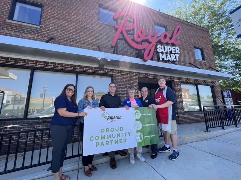 Karly Combest and Adam Crank from Ameren Illinois join Elizabeth Pratt, Patty Gould, Amanda Fox and Ethan Ainley at the Royal Super Mart soft opening.