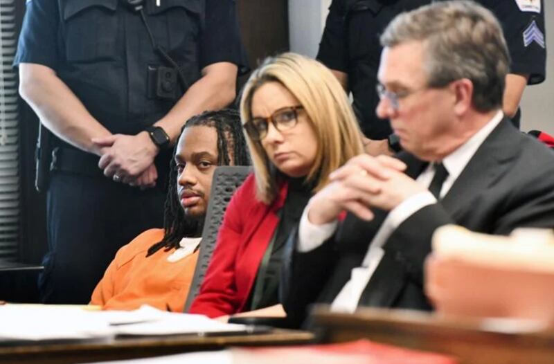 Darius Sullivan, left, listens as he is sentenced to life in prison by Kankakee County Circuit Judge Kathy Bradshaw-Elliott on Tuesday for the December 2021 killing of Bradley Police Sgt. Marlene Rittmanic and the attempted murder of now-retired Sgt. Tyler Bailey. Sullivan, who was found guilty by a jury in September, is represented by Kankakee County Chief Public Defender Ed Pentuic, right, and Assistant Public Defender Jena Jones.