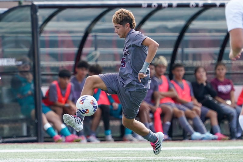 Morton’s Alfredo Campos Nevarez (15) plays the ball during a soccer match against Downers Grove South at Morton High School in Berwyn on Saturday, Oct. 5, 2024.