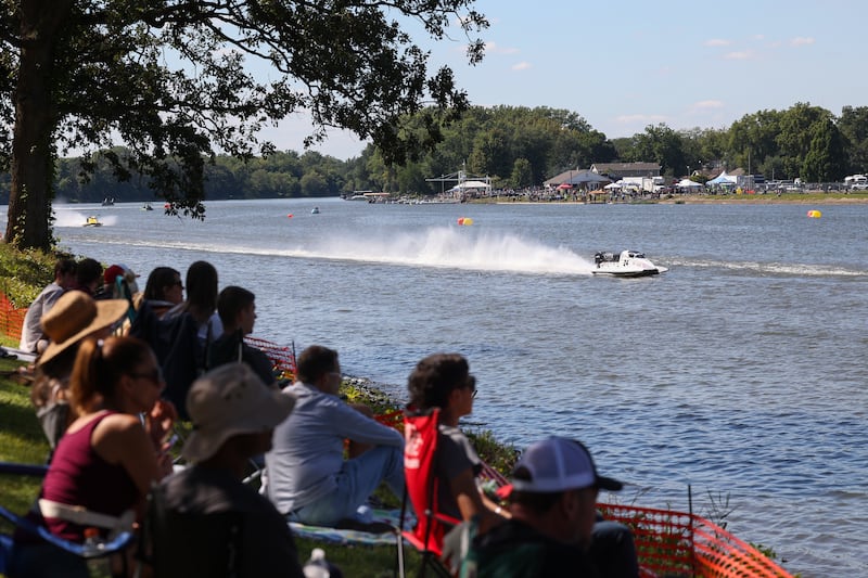Spectators watch as F200 boats compete in a heat race Sunday, Aug. 31, 2025, during the Kankakee River Valley Regatta.