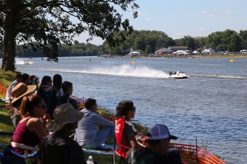 Spectators watch as F200 boats compete in a heat race Sunday, Aug. 31, 2025, during the Kankakee River Valley Regatta.