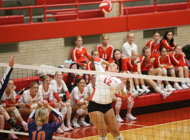 Ottawa's Kerrigan Cooney hits the ball past Pontiac's Madalynn Causer on Tuesday, Sept. 9, 2025 at Kingman Gymnasium.