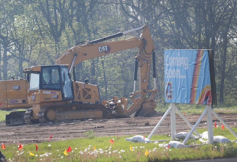 Excavators clear a lot for a future Aldi store on the corner of North Main Street and Backbone Road on Tuesday, May 6, 2025. Aldi broke ground last week. The timeline is to have the store open by Thanksgiving this year.