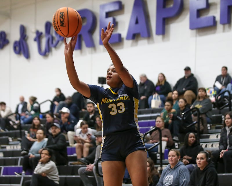 Yorkville Christian's Kiana Ogulei (33) shoots a three during their basketball game between Yorkville Christian at Plano Wednesday, Jan 07, 2026 in Plano.