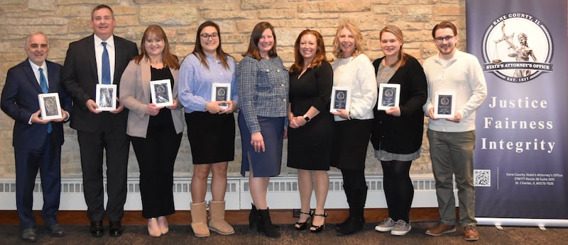 Kane County State's Attorney Jamie Mosser recognized seven employees for excellence in 2025. From left, prosecutors Greg Sams, (left) Dave Belshan, victim services Holly Novak, prosecutor Katy Flannagan, First Assistant State’s Attorney Christine Bayer, State’s Attorney Jamie Mosser, executive assistant Kristi Heath, prosecutor Morgan Wilkinson, and IT support Aidan Hughes.