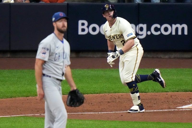 Milwaukee Brewers' Andrew Vaughn watches after hitting a home run during the fourth inning of Game 5 of baseball's National League Division Series against the Chicago Cubs Saturday, Oct. 11, 2025, in Milwaukee. (AP Photo/Morry Gash)