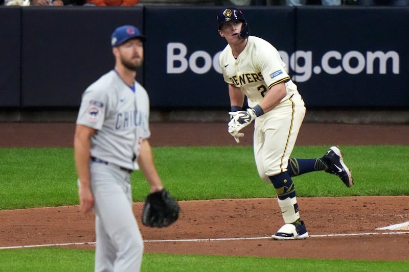 Milwaukee Brewers' Andrew Vaughn watches after hitting a home run during the fourth inning of Game 5 of baseball's National League Division Series against the Chicago Cubs Saturday, Oct. 11, 2025, in Milwaukee. (AP Photo/Morry Gash)