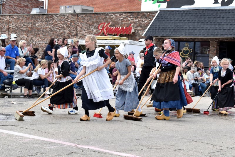 Youth dressed in authentic Dutch attire scrub the street down with brooms before Fulton’s 50th annual Dutch Days parade on Saturday, May 4. More photos on page 3.
