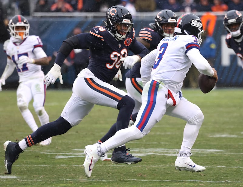 Chicago Bears defensive end Montez Sweat chases down New York Giants quarterback Russell Wilson for a sack Sunday, Nov. 9, 2025, during their game at Soldier Field in Chicago.