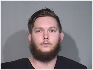 Marengo man accused of restraining woman by screwing apartment door shut