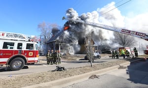 Photos: La Salle firefighters battle two-story house fire on Bucklin Street