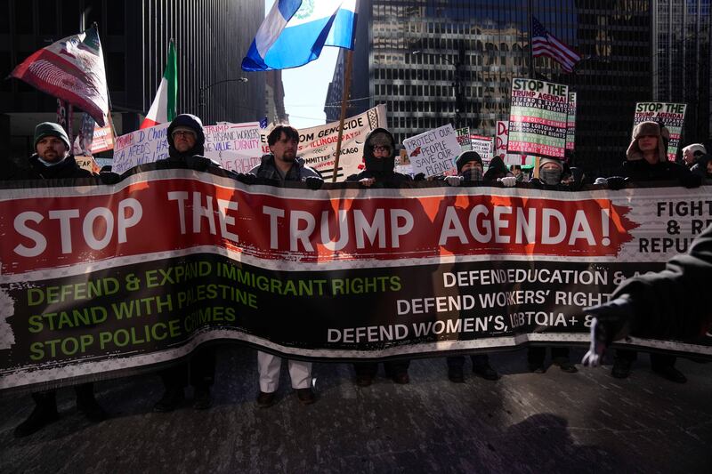 FILE - Anti-Trump protesters march to Trump Tower as they rally for a number of issues, including immigrant rights, the Israel-Hamas war, women's reproductive rights, racial equality and others, on the day of President Trump's Inauguration, Monday, Jan. 20, 2025, in Chicago. (AP Photo/Erin Hooley,File)