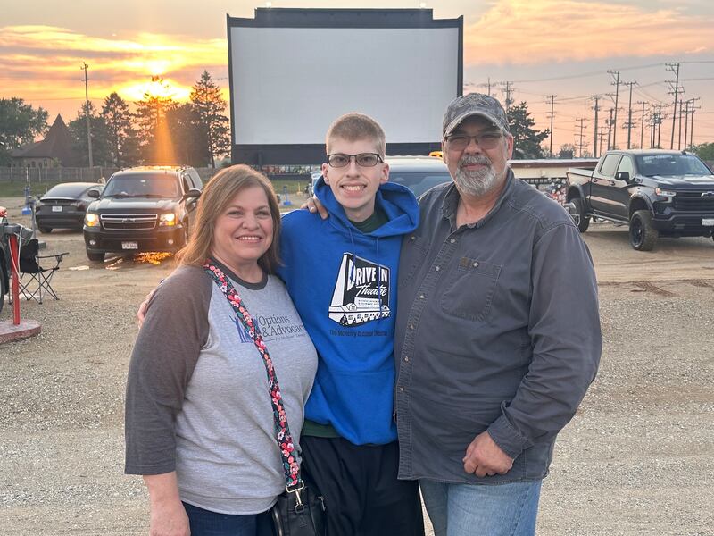 Dylan Krambeer (center) recently visited the McHenry Outdoor with his mother, Angela Krambeer, and father, Chris Kambeer, to talk with President of Marketing and Promotions Joe Cicero about the theater's new Sensory-Friendly Wednesdays.