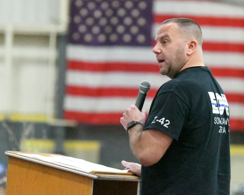 DeKalb County sheriff's Lt. Ryan Pettengell speaks during a memorial vigil for the late DeKalb County sheriff's Christina Musil, 35, held on Saturday, March 29, 2025, at the Sycamore High School Field House. Musil was killed in the line of duty in a rear-end car crash in Waterman while on patrol on March 28, 2024.