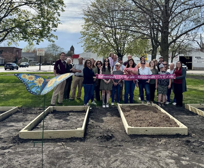 The City of La Salle Foundation celebrated its newly-created community garden with a ribbon cutting ceremony on Tuesday. The sponsors are Illinois Valley Garden Club, City of La Salle Foundation, NCI Artworks and Home Depot.