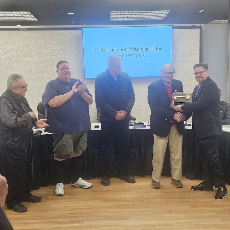 Ken Ficek thought he was simply getting a plaque honoring his 55 years’ service to Oglesby, including city council and the plan commission. The Oglesby City Council had something else in mind. Tuesday, Ficek was surprised with a key to the city. Joining Mayor Jason Curran (right) in presenting the key to Ficek were (from left) former mayors Dom Rivara, Don Finley and Alan Pittman. (Former Mayor George Cullinan was unwell but did send his greetings.) It is believed to be the first time a key to the city was conferred in Oglesby.