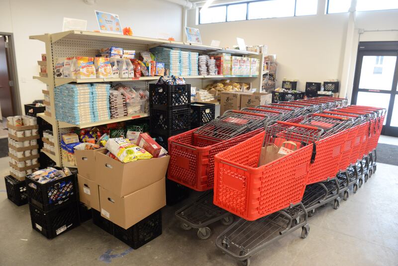 Food is stocked on shelves in the pantry of the People’s Resource Center on Friday, Feb. 14, 2025 in Wheaton.