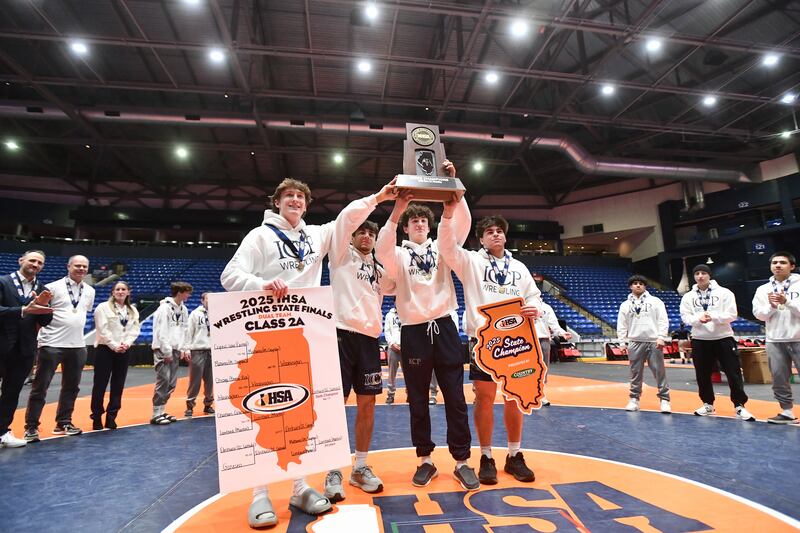 IC Catholic Prep captains receive the Class 2A championship trophy at the IHSA Dual Team State Finals on Saturday, March 1.